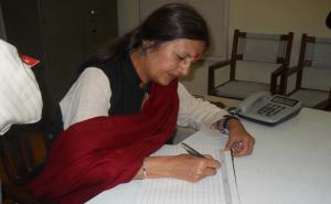 Brinda Signing the Visitor's Book at Jalianwala Bagh